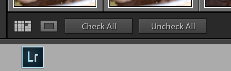 Press and hold the Alt/Option key in the Lightroom import dialog go reveal the "Check Videos" and "Uncheck Videos" buttons